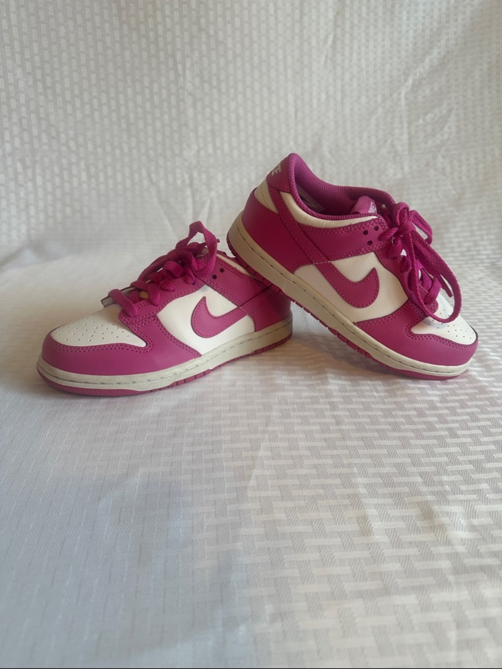 #876 Nike Kids Pink and White Low Top Sneakers